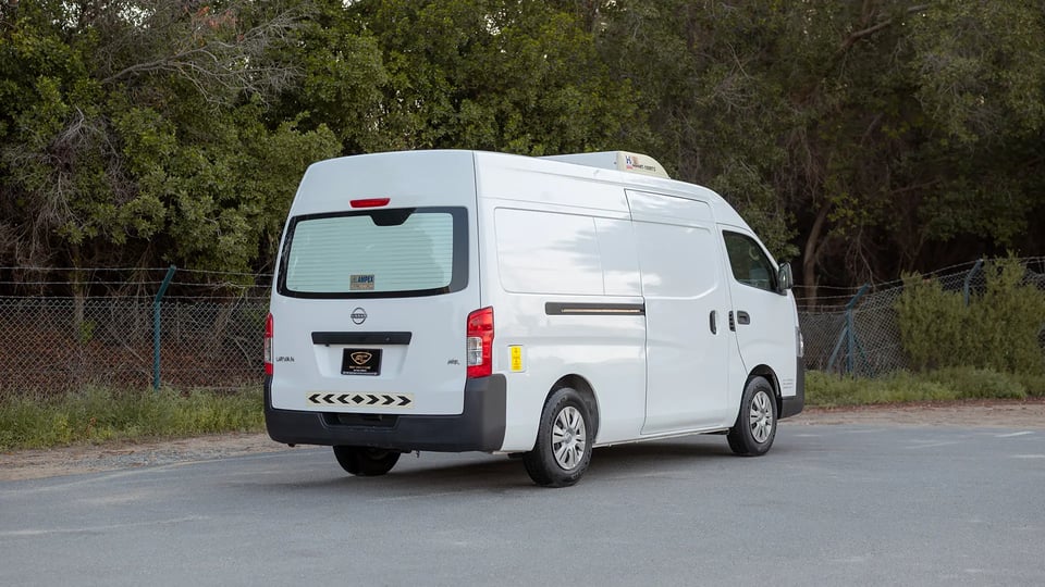 Used 2023 Nissan Urvan High Roof in White – Right Back Diagonal (45°) View for Sale at First Choice Cars Dubai Sharjah