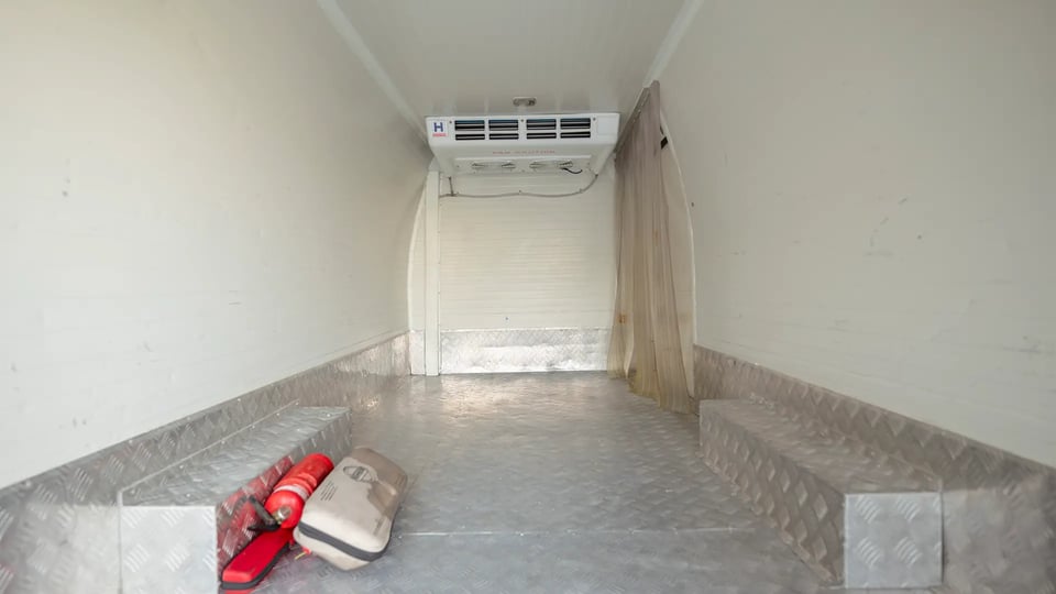 Used 2023 Nissan Urvan High Roof in White – Chiller Box Rear Opening View for Sale at First Choice Cars Dubai Sharjah