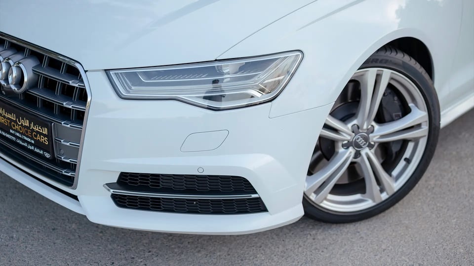 Used 2016 Audi S6 TFSI Quattro in White – Headlight Close-up for Sale at First Choice Cars Dubai Sharjah