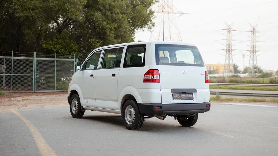 Used 2013 Suzuki APV Passanger Van in White – Left Back Diagonal (45°) View for Sale at First Choice Cars Dubai Sharjah