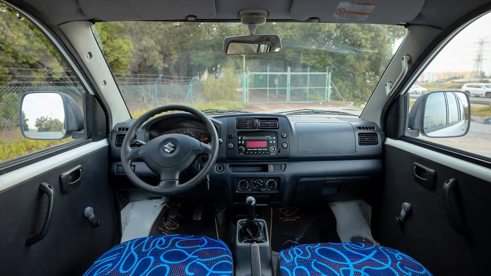 Used 2013 Suzuki APV Passanger Van in White – Front Cabin / Dashboard Full View for Sale at First Choice Cars Dubai Sharjah