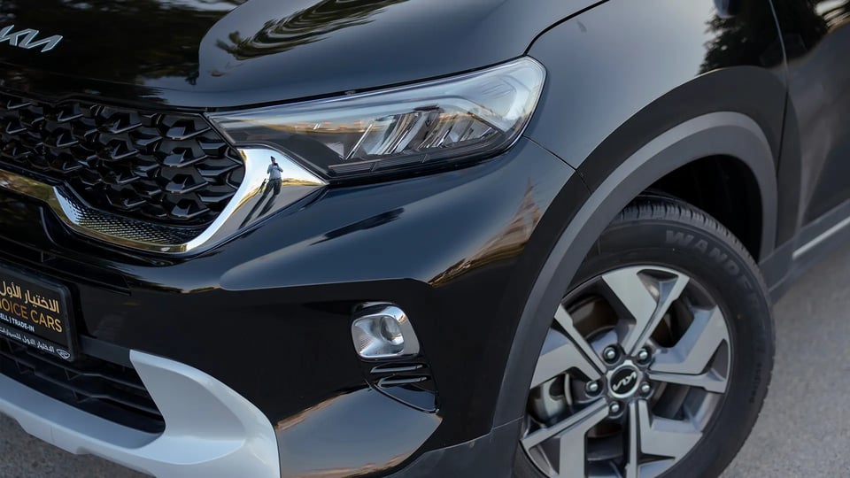 Used 2024 Kia Sonet EX in Black – Headlight Close-up for Sale at First Choice Cars Dubai Sharjah