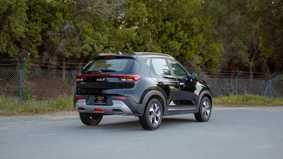 Used 2024 Kia Sonet EX in Black – Right Back Diagonal (45°) View for Sale at First Choice Cars Dubai Sharjah