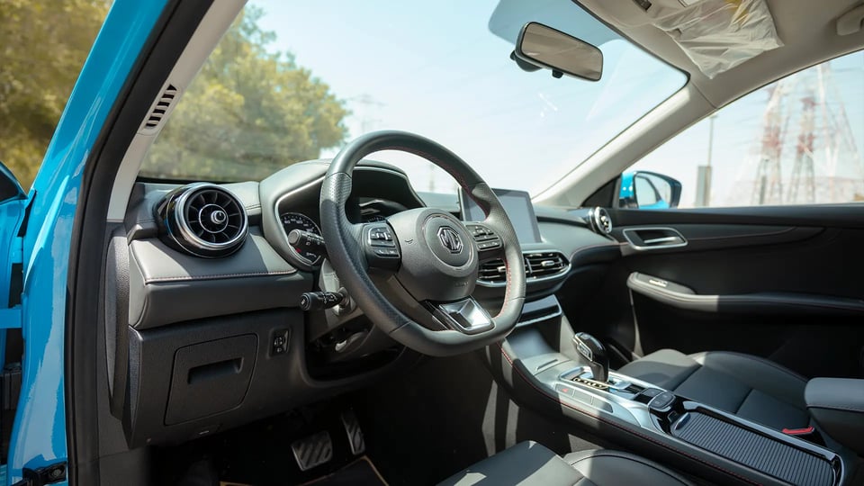 Used 2024 MG HS 30T in Blue – Driver Side Dashboard & Steering View for Sale at First Choice Cars Dubai Sharjah