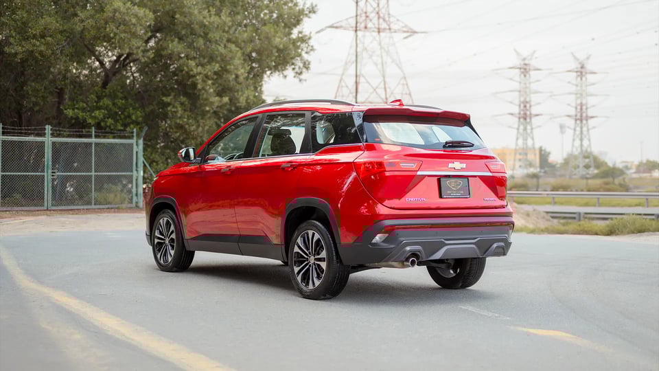 Used 2023 Chevrolet Captiva Premier in Red – Left Back Diagonal (45°) View for Sale at First Choice Cars Dubai Sharjah