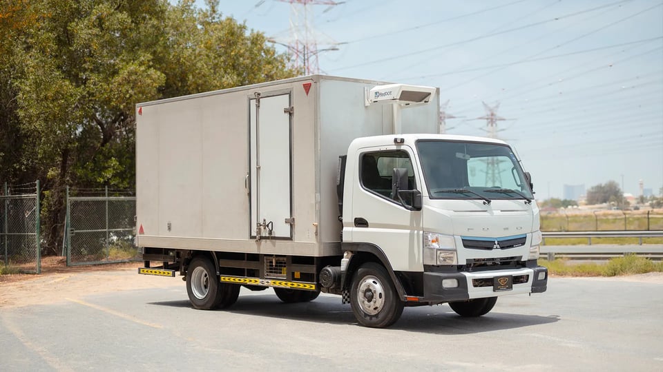 Used 2020 Mitsubishi Canter Chiller Box in White – Right Front Diagonal (45°) View for Sale at First Choice Cars Dubai Sharjah
