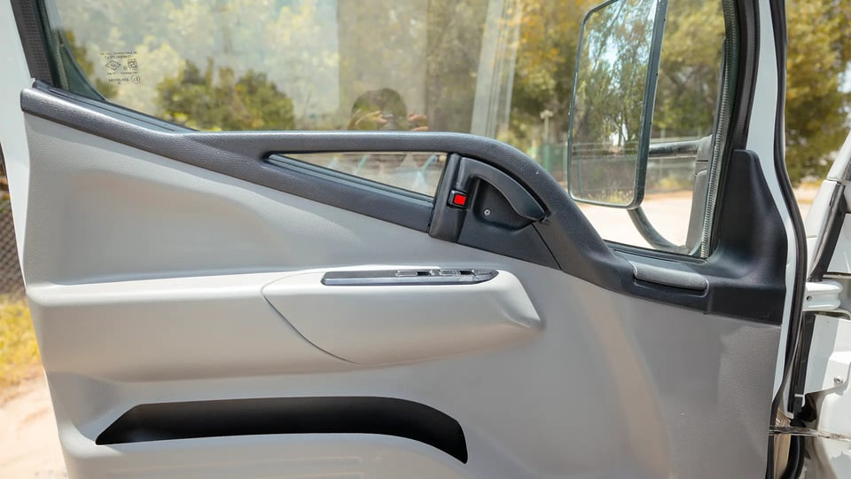 Used 2020 Mitsubishi Canter Chiller Box in White – Driver Door Panel Full View for Sale at First Choice Cars Dubai Sharjah