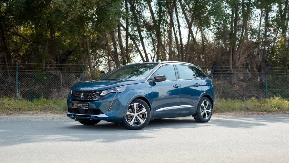Used 2022 Peugeot 3008 Hybrid 4 GT in Blue – Left Front Diagonal (45°) View for Sale at First Choice Cars Dubai Sharjah