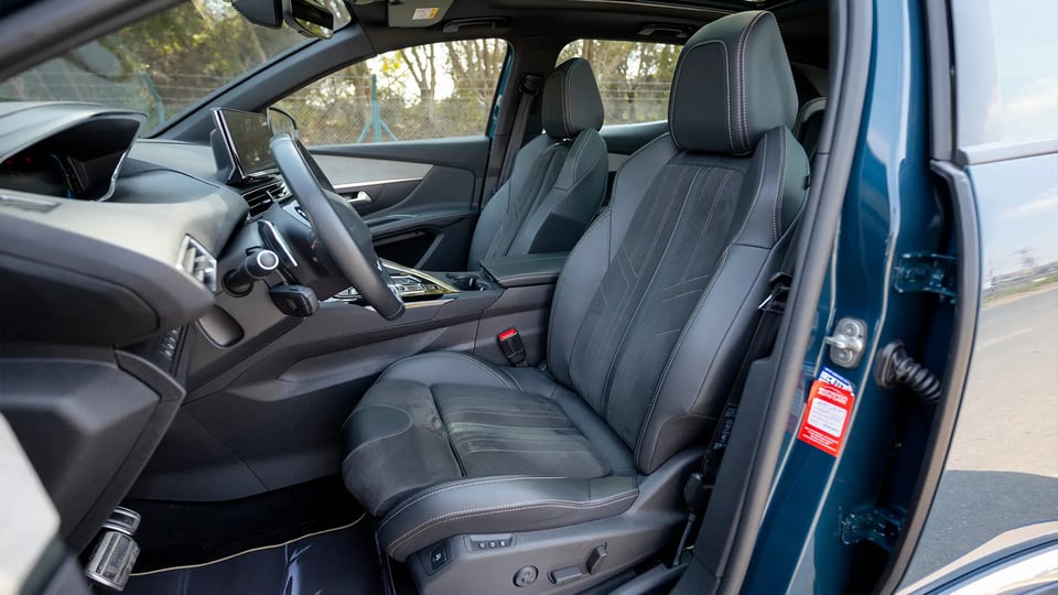 Used 2022 Peugeot 3008 Hybrid 4 GT in Blue – Front Driver Side Cabin View for Sale at First Choice Cars Dubai Sharjah