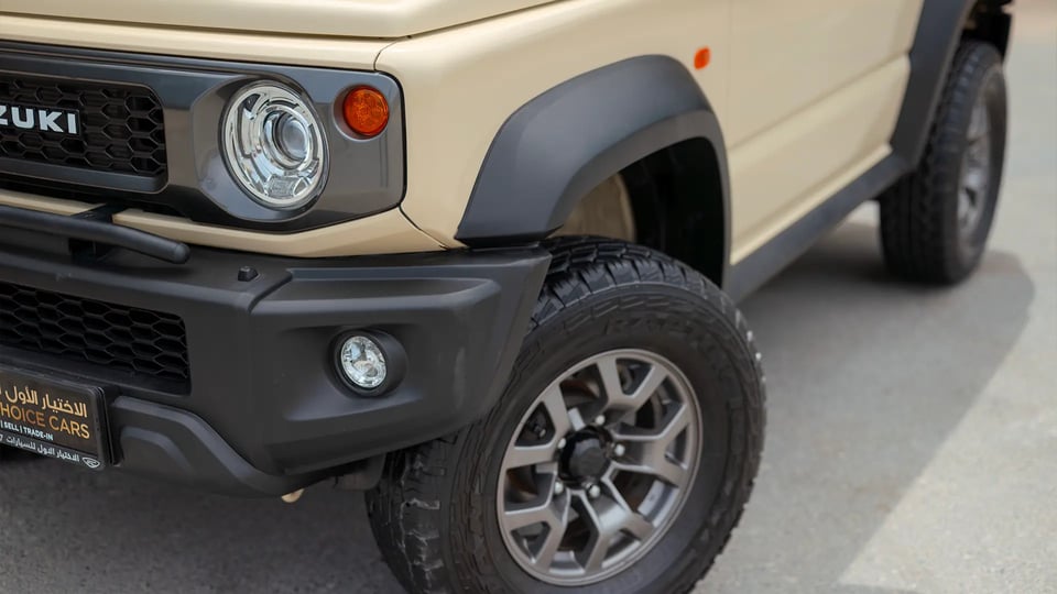 Used 2025 Suzuki Jimny GLX in Beige – Headlight Close-up for Sale at First Choice Cars Dubai Sharjah