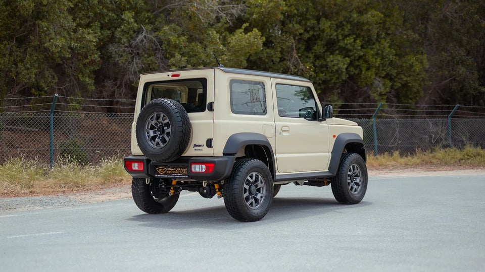 Used 2025 Suzuki Jimny GLX in Beige – Right Back Diagonal (45°) View for Sale at First Choice Cars Dubai Sharjah