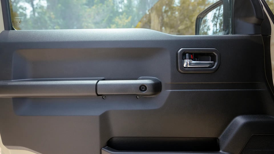 Used 2025 Suzuki Jimny GLX in Beige – Driver Door Panel Full View for Sale at First Choice Cars Dubai Sharjah