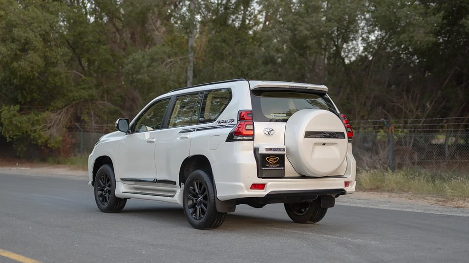 Used 2022 Toyota Prado VXR in White – Left Back Diagonal (45°) View for Sale at First Choice Cars Dubai Sharjah