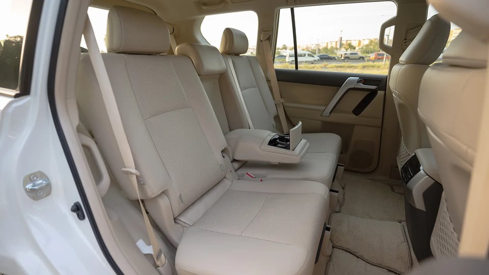 Used 2022 Toyota Prado VXR in White – Rear Passenger Side Cabin View for Sale at First Choice Cars Dubai Sharjah