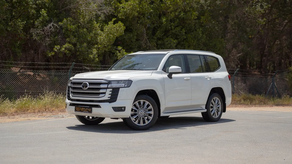 Used 2024 Toyota Land Cruiser GXR in White – Left Front Diagonal (45°) View for Sale at First Choice Cars Dubai Sharjah