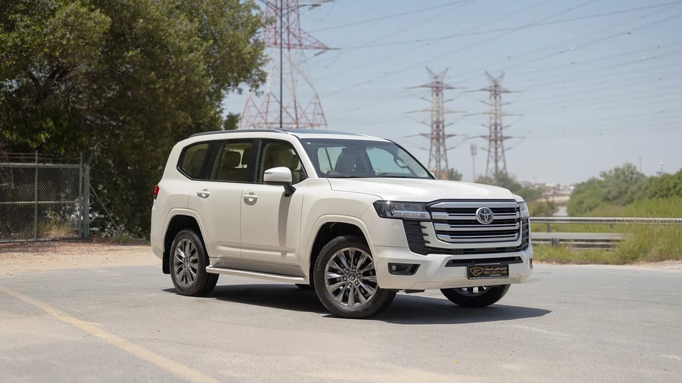 Used 2024 Toyota Land Cruiser GXR in White – Right Front Diagonal (45°) View for Sale at First Choice Cars Dubai Sharjah