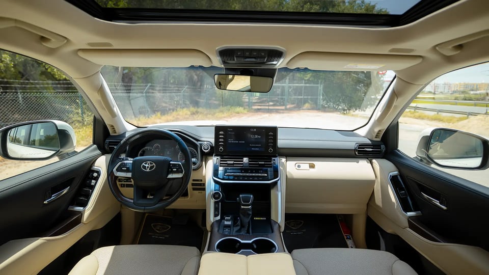 Used 2024 Toyota Land Cruiser GXR in White – Front Cabin / Dashboard Full View for Sale at First Choice Cars Dubai Sharjah