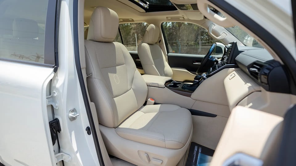 Used 2024 Toyota Land Cruiser GXR in White – Front Passenger Side Cabin View for Sale at First Choice Cars Dubai Sharjah