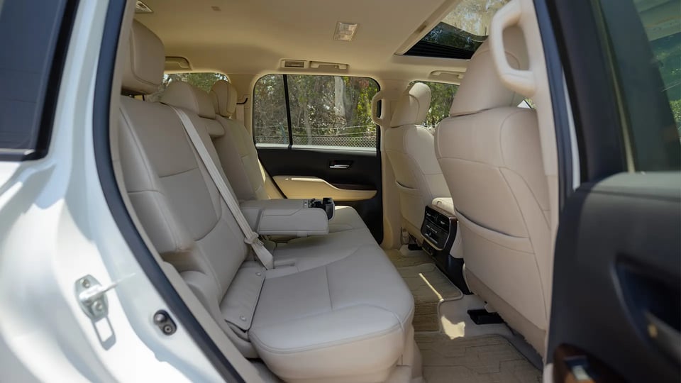 Used 2024 Toyota Land Cruiser GXR in White – Rear Passenger Side Cabin View for Sale at First Choice Cars Dubai Sharjah