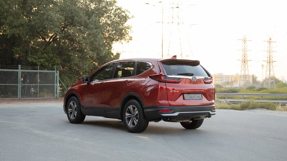 Used 2021 Honda CR-V LX in Red – Left Back Diagonal (45°) View for Sale at First Choice Cars Dubai Sharjah