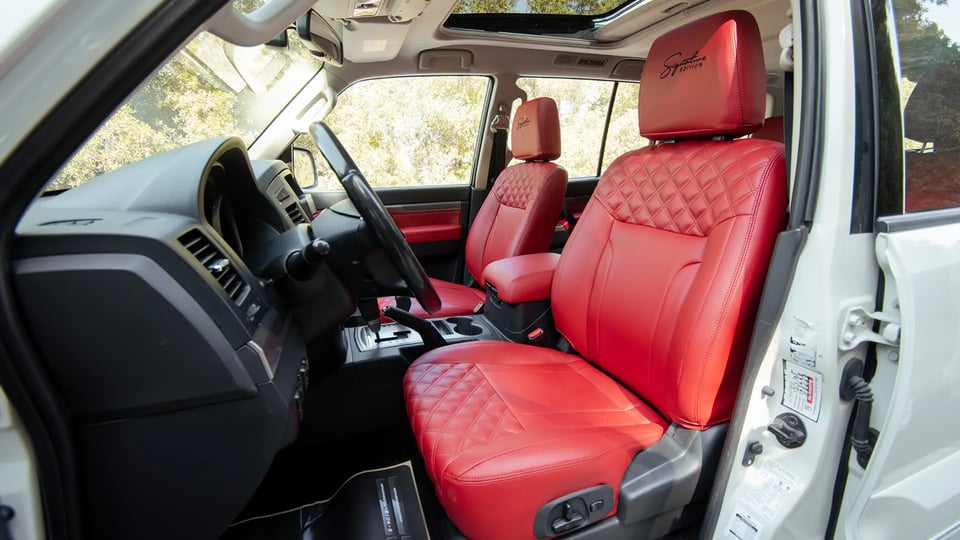 Used 2022 Mitsubishi Pajero GLS in White – Front Driver Side Cabin View for Sale at First Choice Cars Dubai Sharjah