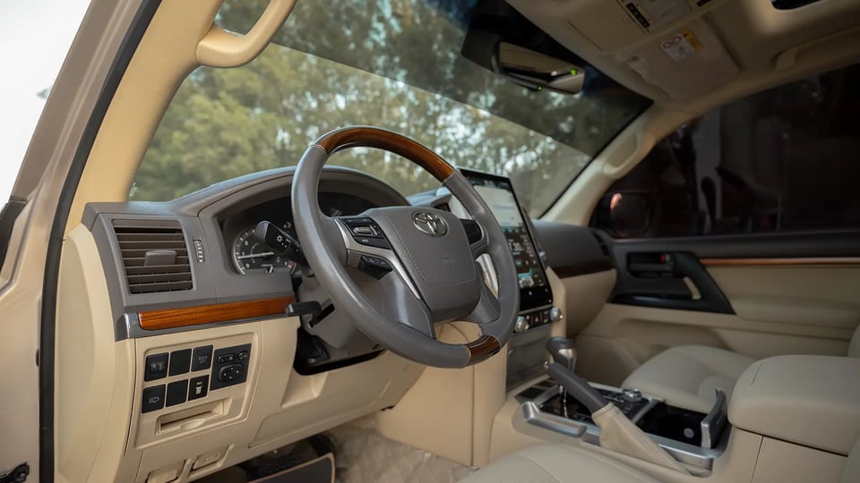 Used 2017 Toyota Land Cruiser GXR in Beige – Driver Side Dashboard & Steering View for Sale at First Choice Cars Dubai Sharjah