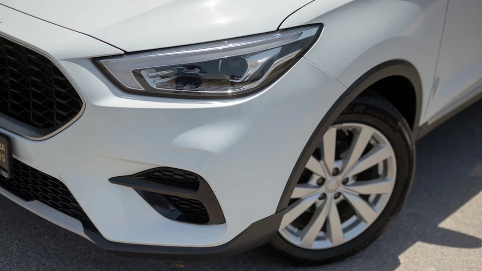 Used 2023 MG ZS Comfort in White – Headlight Close-up for Sale at First Choice Cars Dubai Sharjah