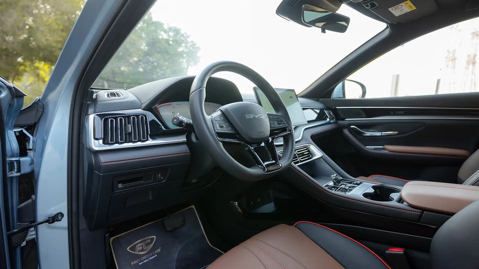 Used 2025 BYD Song Plus Design in Blue – Driver Side Dashboard & Steering View for Sale at First Choice Cars Dubai Sharjah