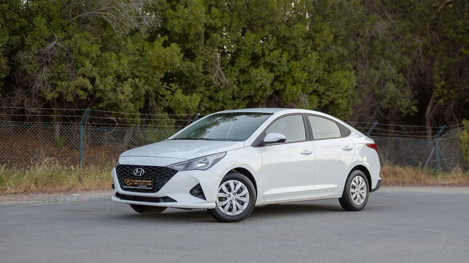Used 2023 Hyundai Accent Smart in White – Left Front Diagonal (45°) View for Sale at First Choice Cars Dubai Sharjah