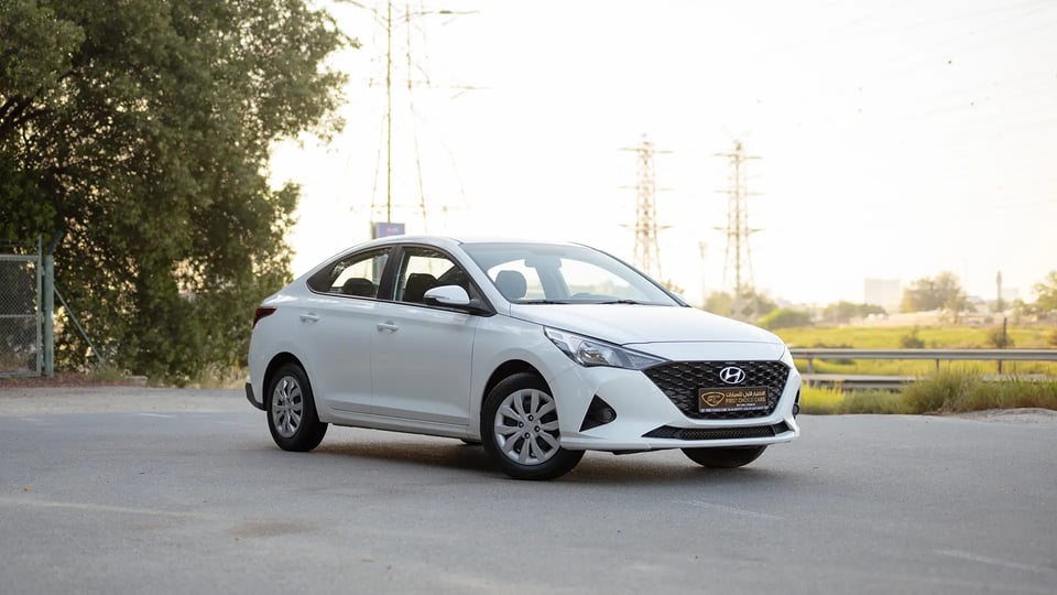 Used 2023 Hyundai Accent Smart in White – Right Front Diagonal (45°) View for Sale at First Choice Cars Dubai Sharjah