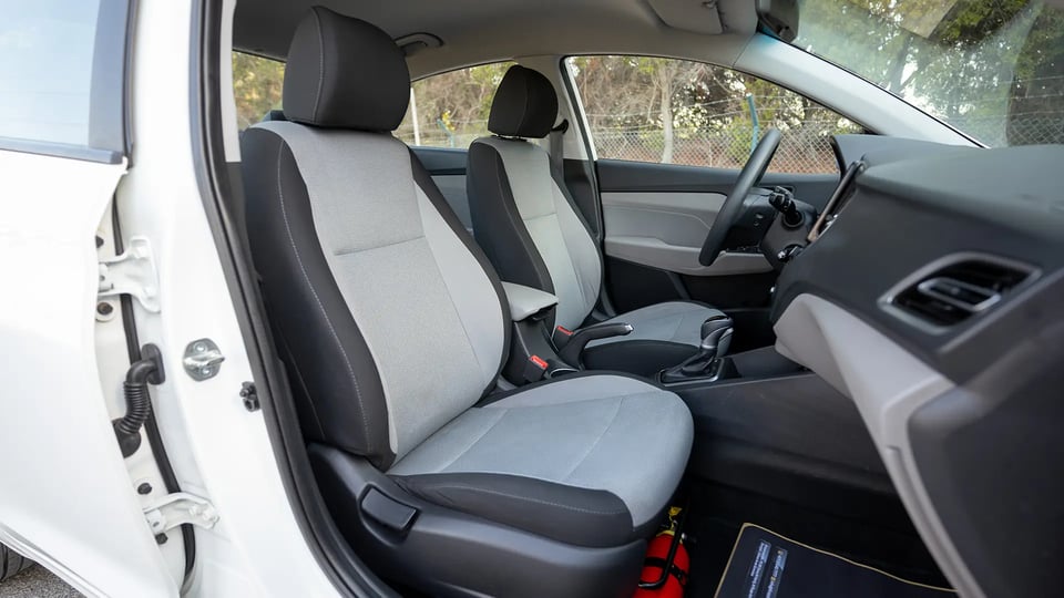 Used 2023 Hyundai Accent Smart in White – Front Passenger Side Cabin View for Sale at First Choice Cars Dubai Sharjah