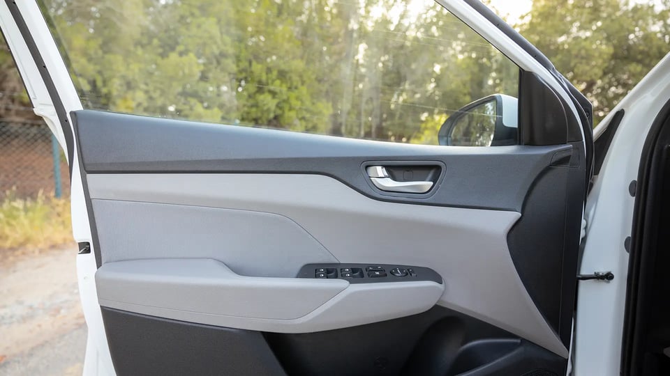 Used 2023 Hyundai Accent Smart in White – Driver Door Panel Full View for Sale at First Choice Cars Dubai Sharjah