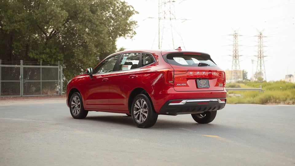 Used 2023 Haval Jolion Plus in Red – Left Back Diagonal (45°) View for Sale at First Choice Cars Dubai Sharjah