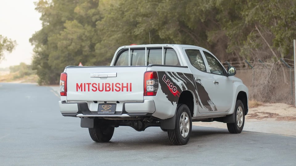 Used 2020 Mitsubishi L200 GLX Double Cabin in White – Right Back Diagonal (45°) View for Sale at First Choice Cars Dubai Sharjah