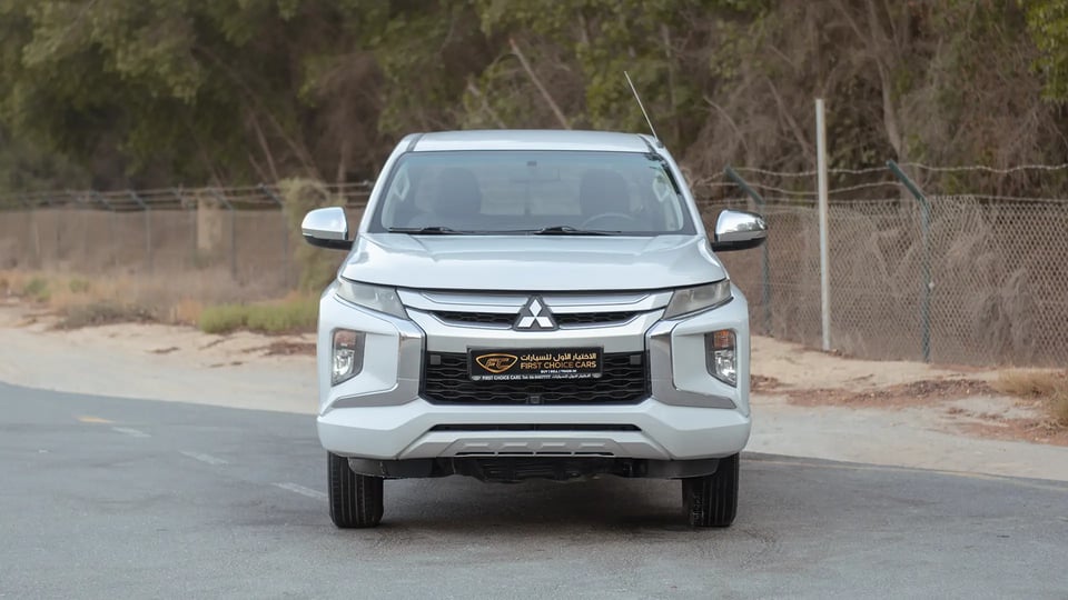 Used 2020 Mitsubishi L200 GLX Double Cabin in White – Front View for Sale at First Choice Cars Dubai Sharjah