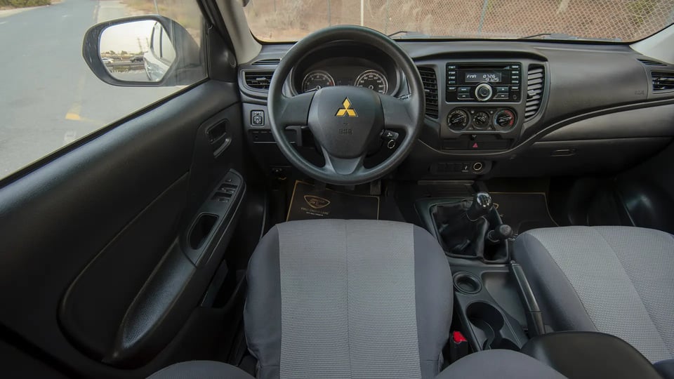 Used 2020 Mitsubishi L200 GLX Double Cabin in White – Steering Wheel & Instrument Cluster for Sale at First Choice Cars Dubai Sharjah