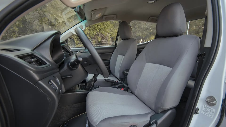 Used 2020 Mitsubishi L200 GLX Double Cabin in White – Front Driver Side Cabin View for Sale at First Choice Cars Dubai Sharjah
