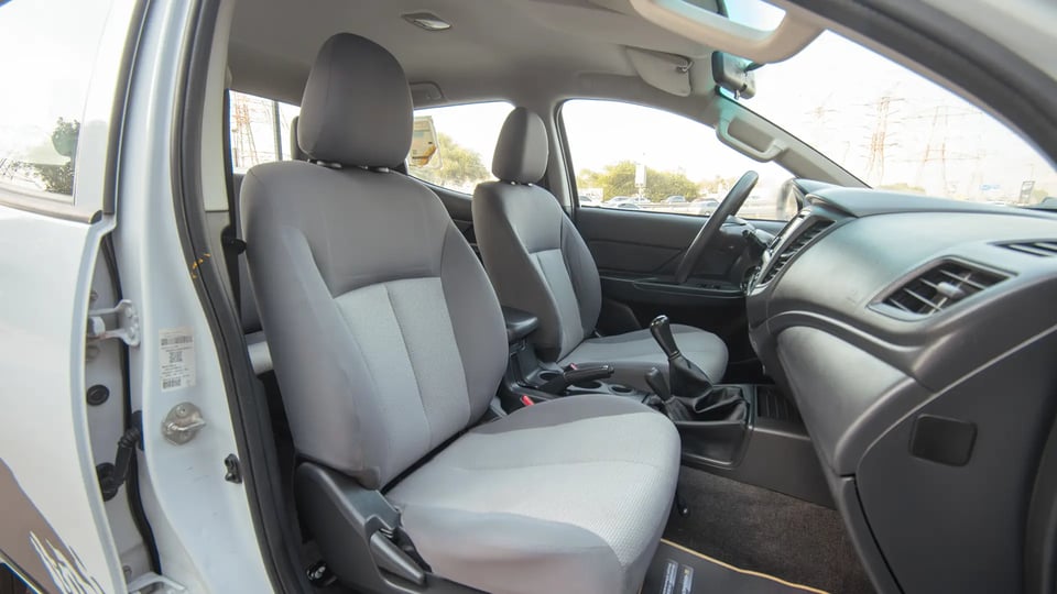 Used 2020 Mitsubishi L200 GLX Double Cabin in White – Front Passenger Side Cabin View for Sale at First Choice Cars Dubai Sharjah