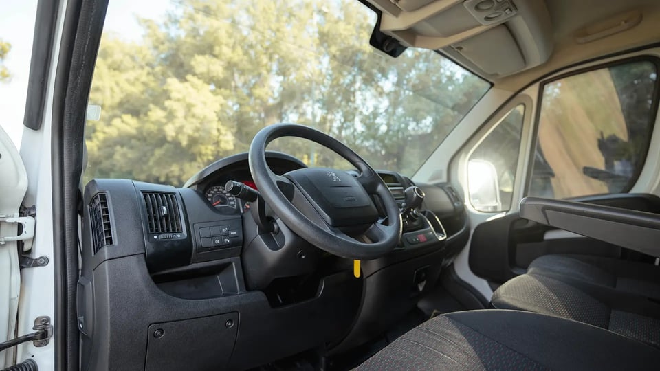 Used 2022 Peugeot Boxer L4H3 in White – Driver Side Dashboard & Steering View for Sale at First Choice Cars Dubai Sharjah