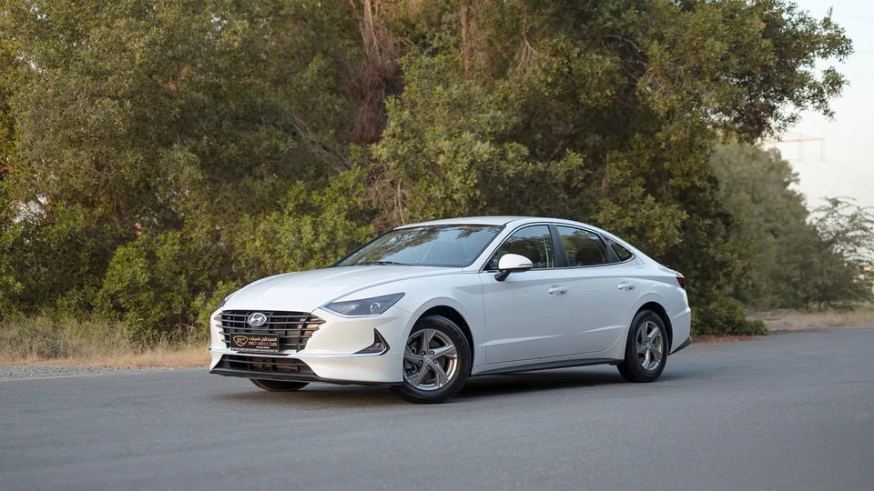Used 2023 Hyundai Sonata Comfort in White – Left Front Diagonal (45°) View for Sale at First Choice Cars Dubai Sharjah
