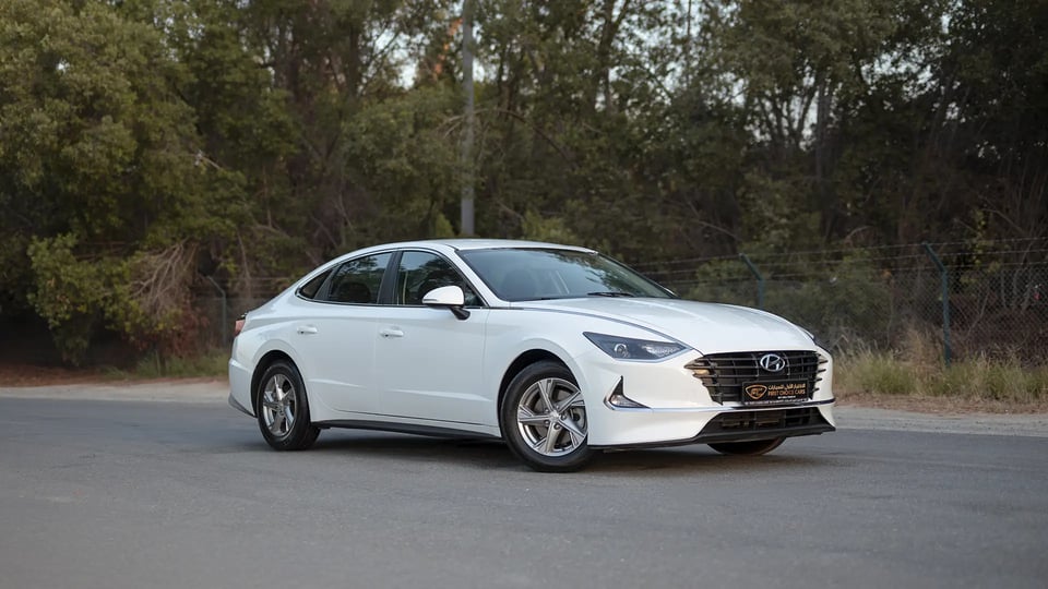 Used 2023 Hyundai Sonata Comfort in White – Right Front Diagonal (45°) View for Sale at First Choice Cars Dubai Sharjah