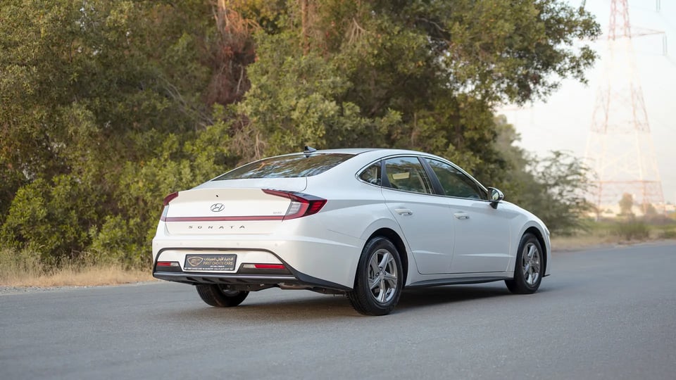 Used 2023 Hyundai Sonata Comfort in White – Right Back Diagonal (45°) View for Sale at First Choice Cars Dubai Sharjah