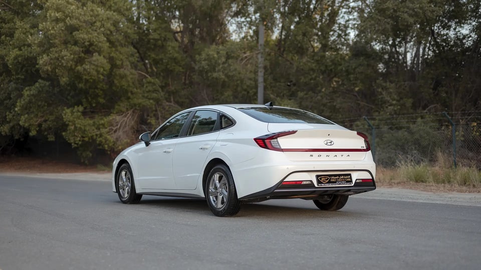 Used 2023 Hyundai Sonata Comfort in White – Left Back Diagonal (45°) View for Sale at First Choice Cars Dubai Sharjah