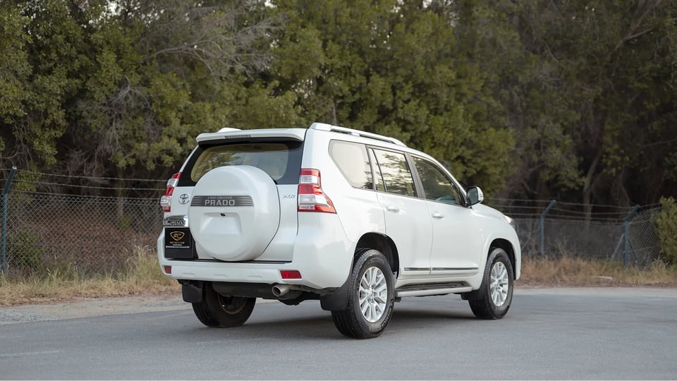 Used 2016 Toyota Prado VXR in White – Right Back Diagonal (45°) View for Sale at First Choice Cars Dubai Sharjah