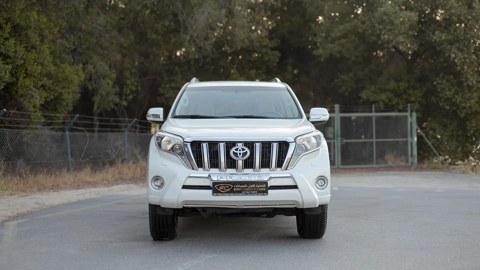 Used 2016 Toyota Prado VXR in White – Front View for Sale at First Choice Cars Dubai Sharjah