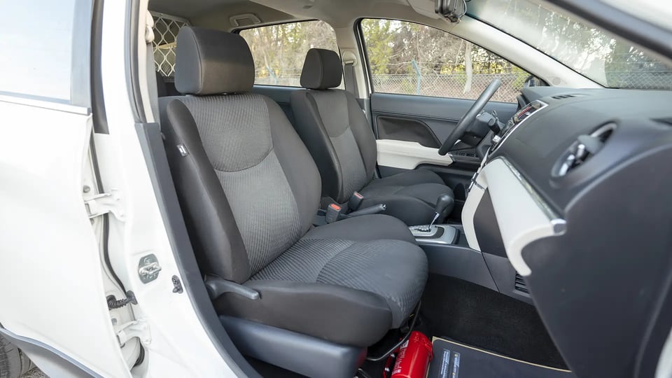 Used 2022 Toyota Rush EX in White – Front Passenger Side Cabin View for Sale at First Choice Cars Dubai Sharjah