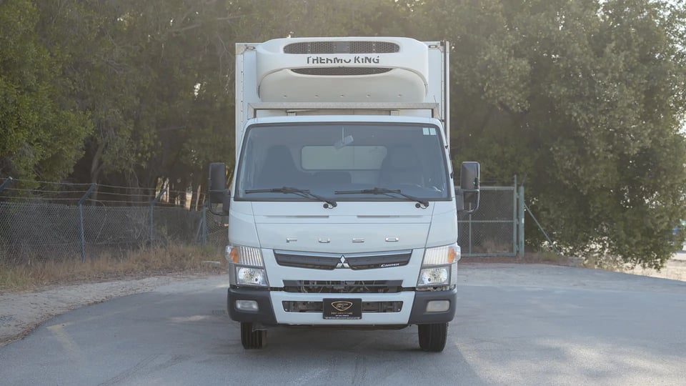 Used 2022 Mitsubishi Canter Chiller Box in White – Front View for Sale at First Choice Cars Dubai Sharjah