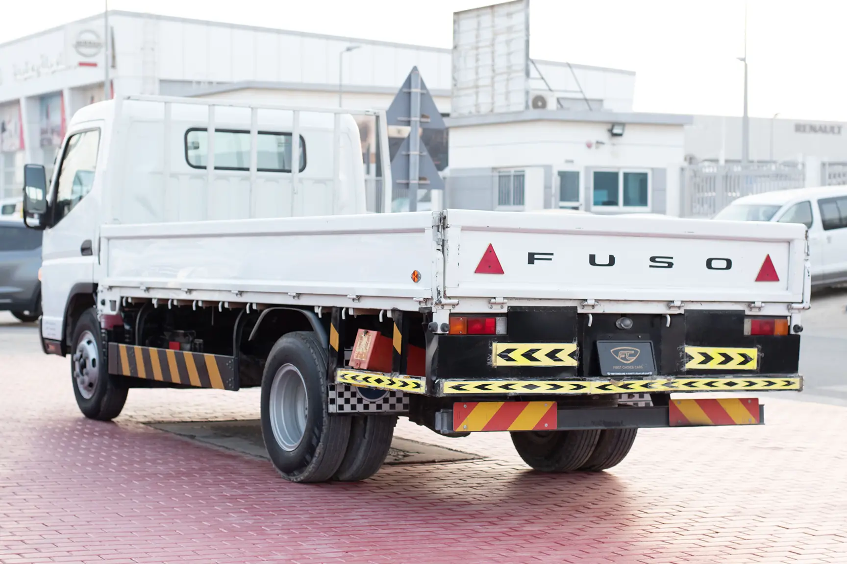 Used 2017 Mitsubishi Canter Cargo Body White – Left Back Diagonal (45°) View at First Choice Cars Sharjah
