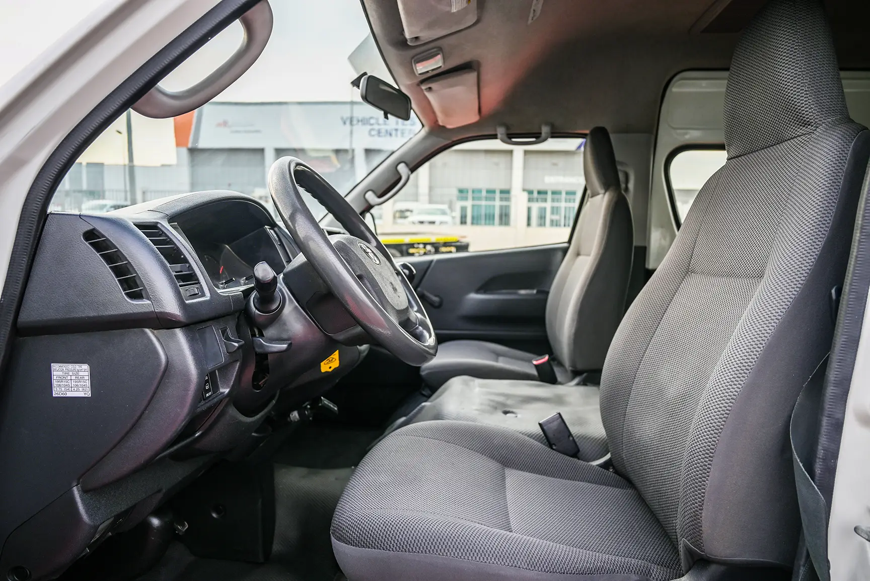 Used 2017 Toyota Hiace GLX - High Roof White – Front Driver Side Cabin View at First Choice Cars Sharjah