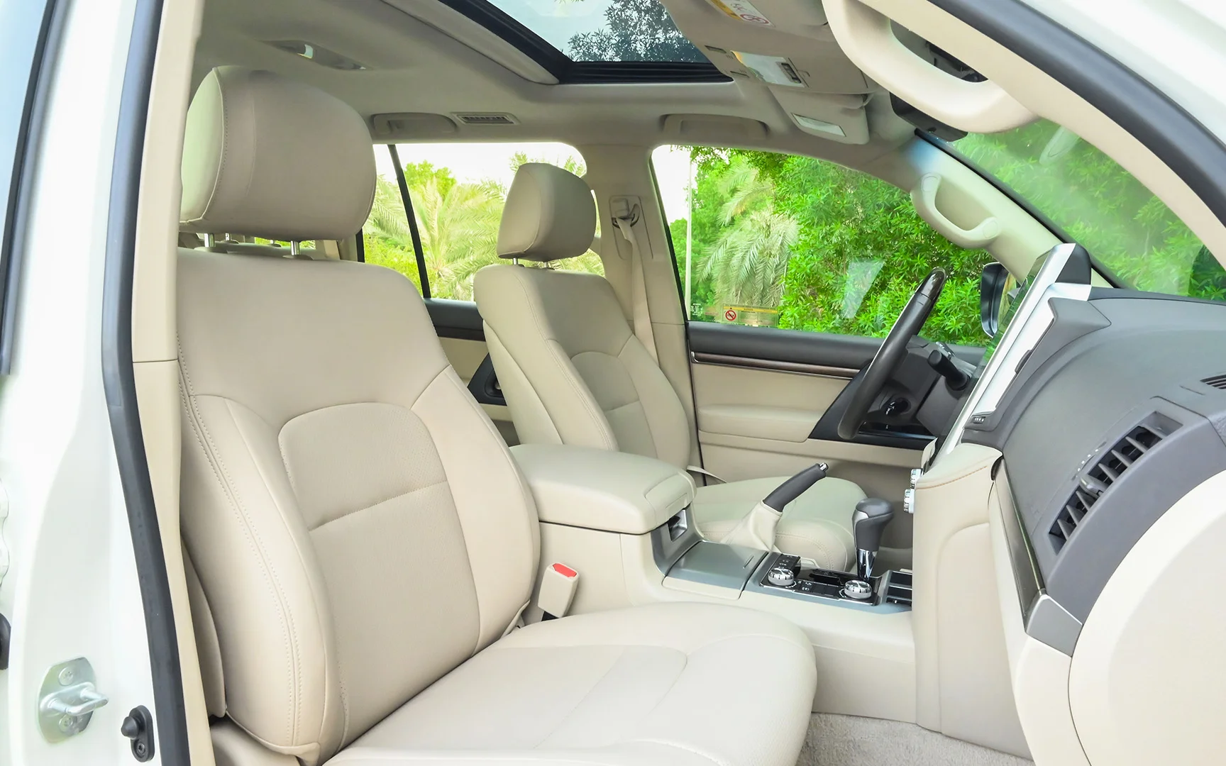 Used 2021 Toyota Land Cruiser GXR White – Front Passenger Side Cabin View at First Choice Cars Sharjah